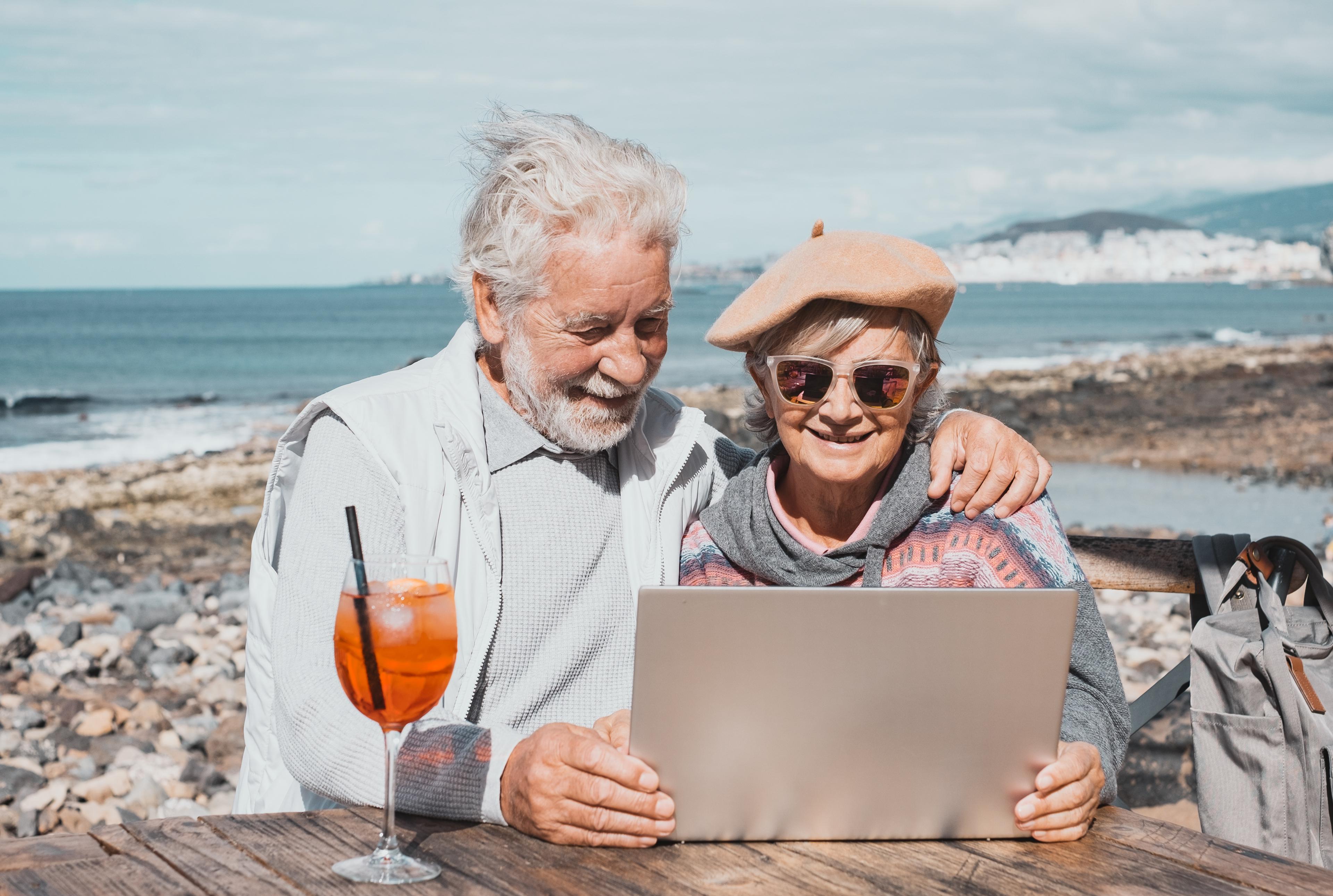 Elderly couple with photo memories
